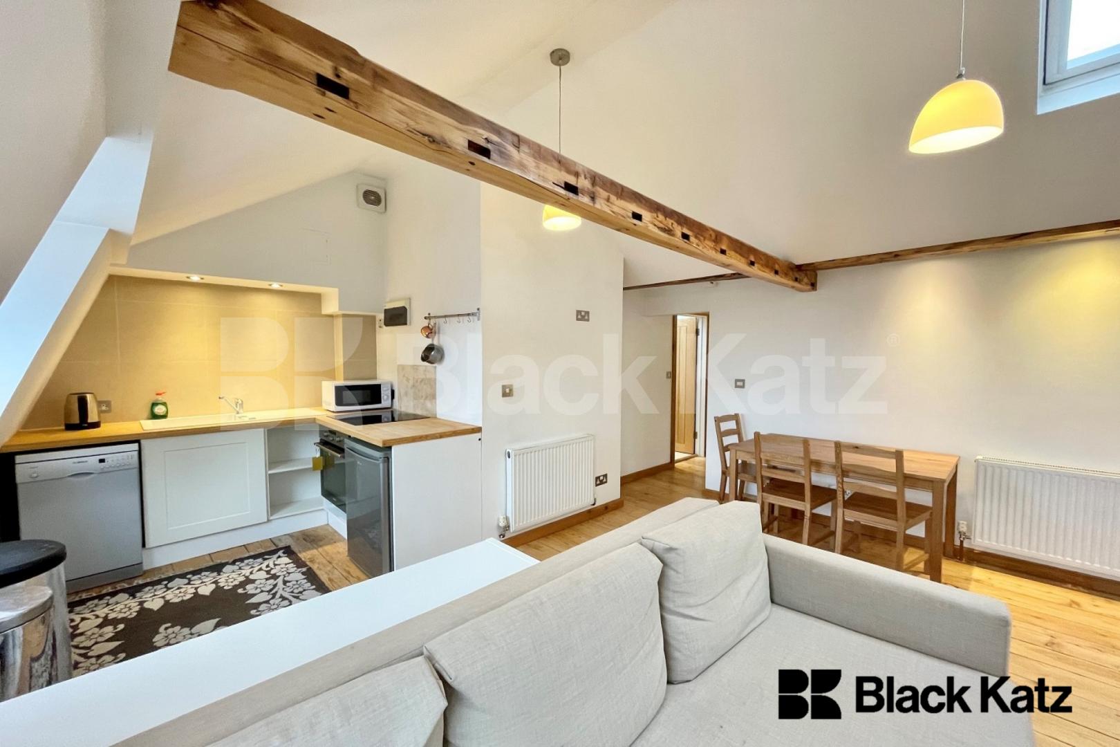  top floor conversion boasts stylish decor throughout and an abundance of light Surrey Square, Elephant & Castle